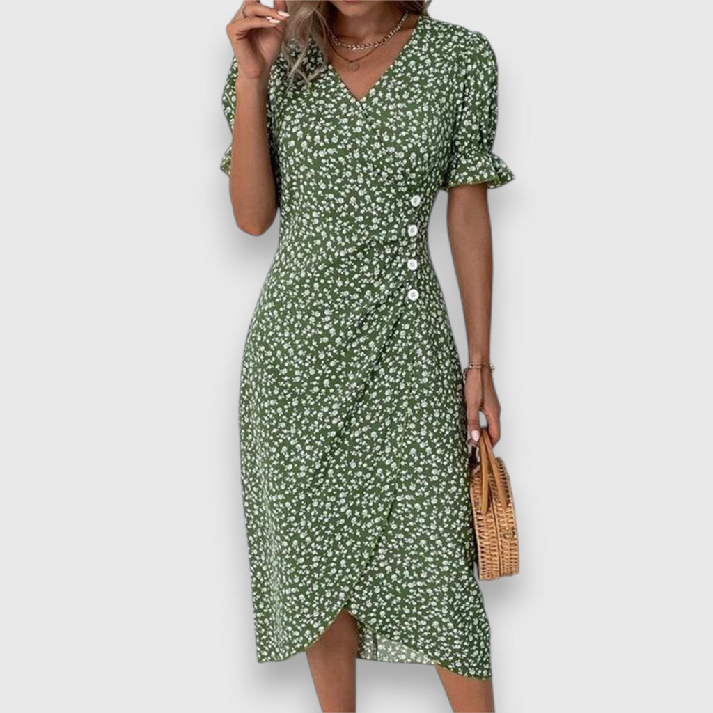 Vestido floral con mangas abullonadas y detalle romántico
