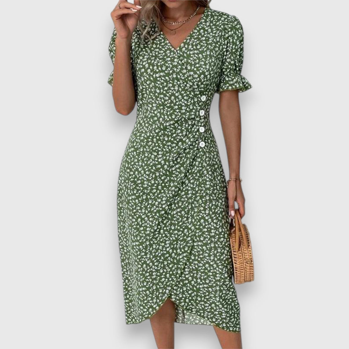 Vestido floral con mangas abullonadas y detalle romántico