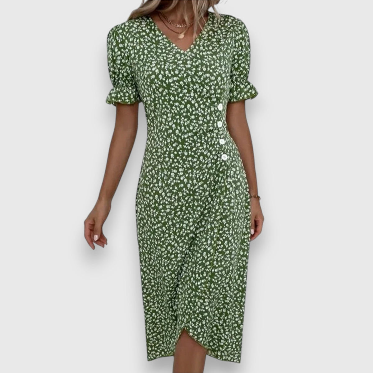Vestido floral con mangas abullonadas y detalle romántico