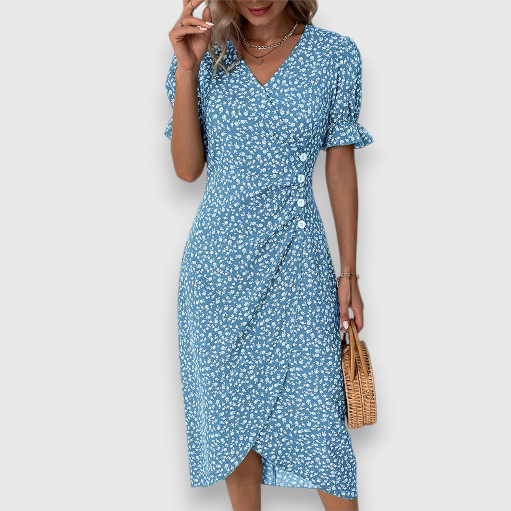 Vestido floral con mangas abullonadas y detalle romántico