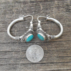 Ornate Huggie Earrings with Blue-Green Stone in Silver Colour