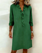 Vestido de algodón y lino con cuello de pico y detalle de volantes