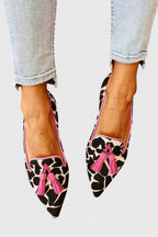 Loafers med spetsig tå och öppen design