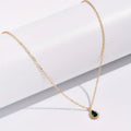 Fine Chain Necklace with Tiny Dark Stone in Gold Colour
