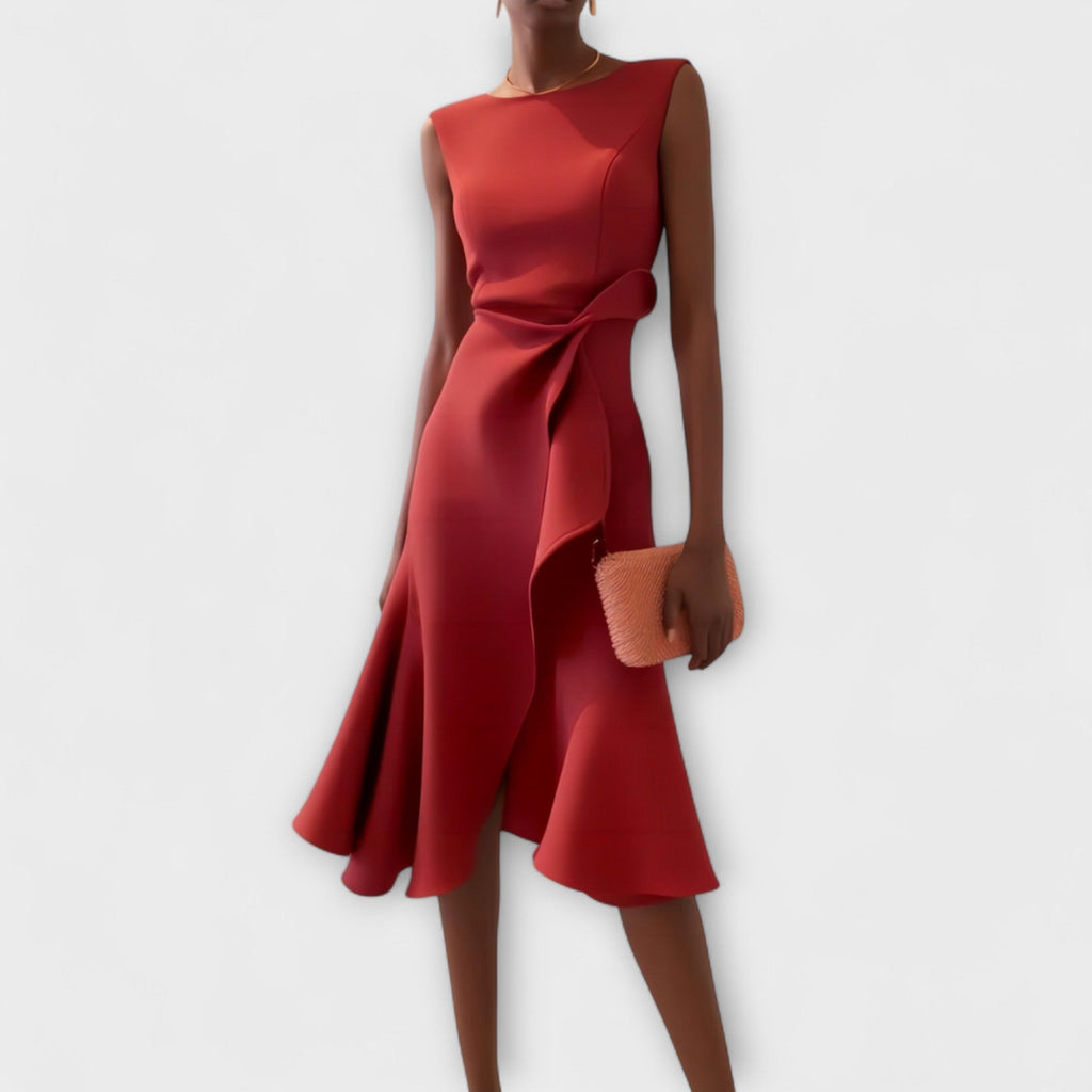 Vestido midi entallado y femenino de silueta favorecedora