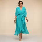 Flowing V-neck dress with soft draping detail