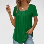 Blusa de verano con escote cuadrado y pliegues sutiles