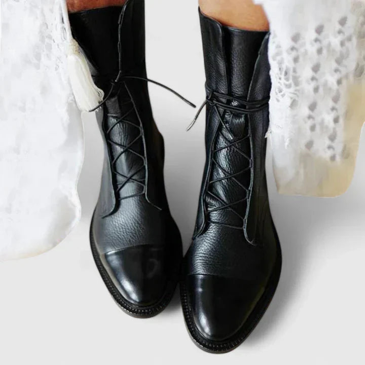 Boots med dämpat stöd och ren linje