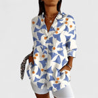 Blusa floral abotonada de tacto ligero y vaporoso