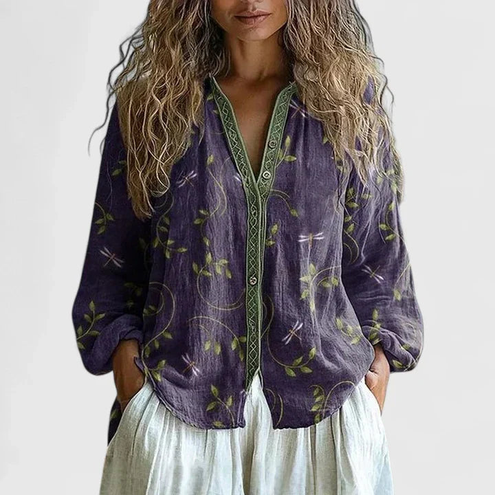 Blusa con estampado retro de hojas y corte moderno