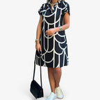 Vestido midi por capas con manga corta y caída fluida