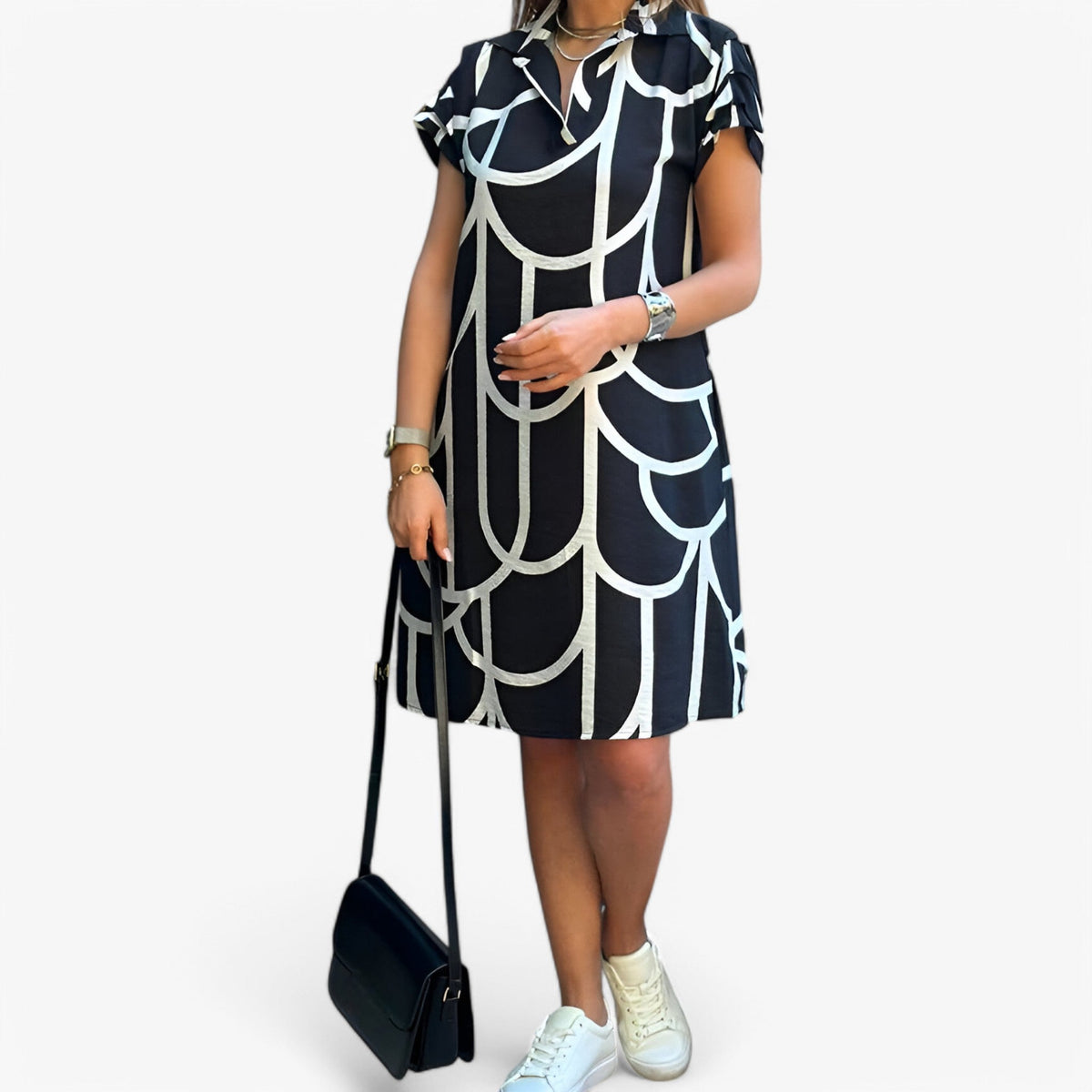 Vestido midi por capas con manga corta y caída fluida