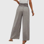 Pantalones palazzo de talle alto con pierna ancha y fluida