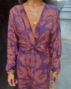 Vestido largo estampado con escote de pico y manga larga