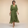 Flowing V-neck dress with soft draping detail