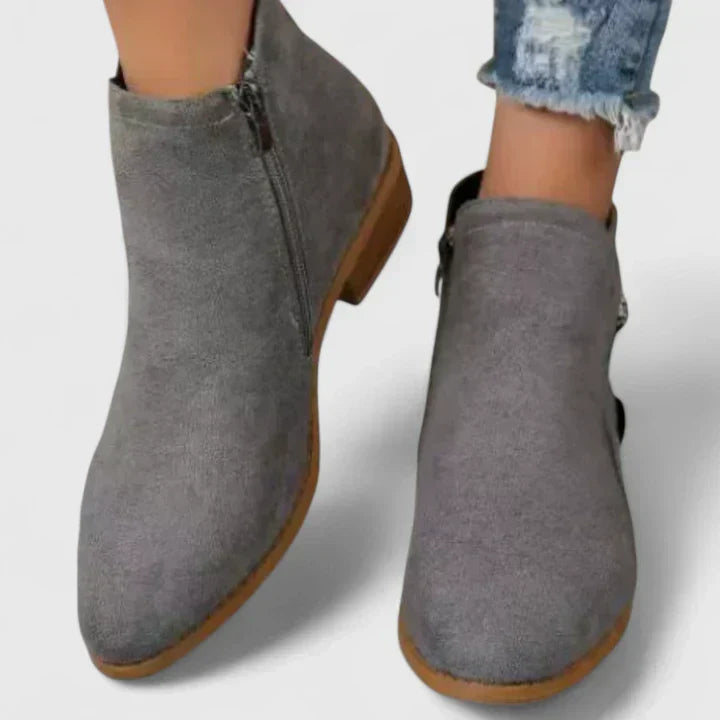 Vattenavvisande boots med stödjande konstruktion