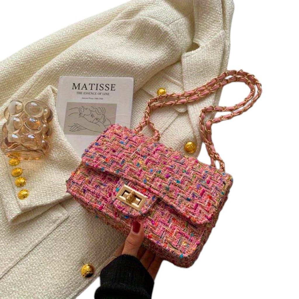 Strukturerad axelväska med invändiga fack