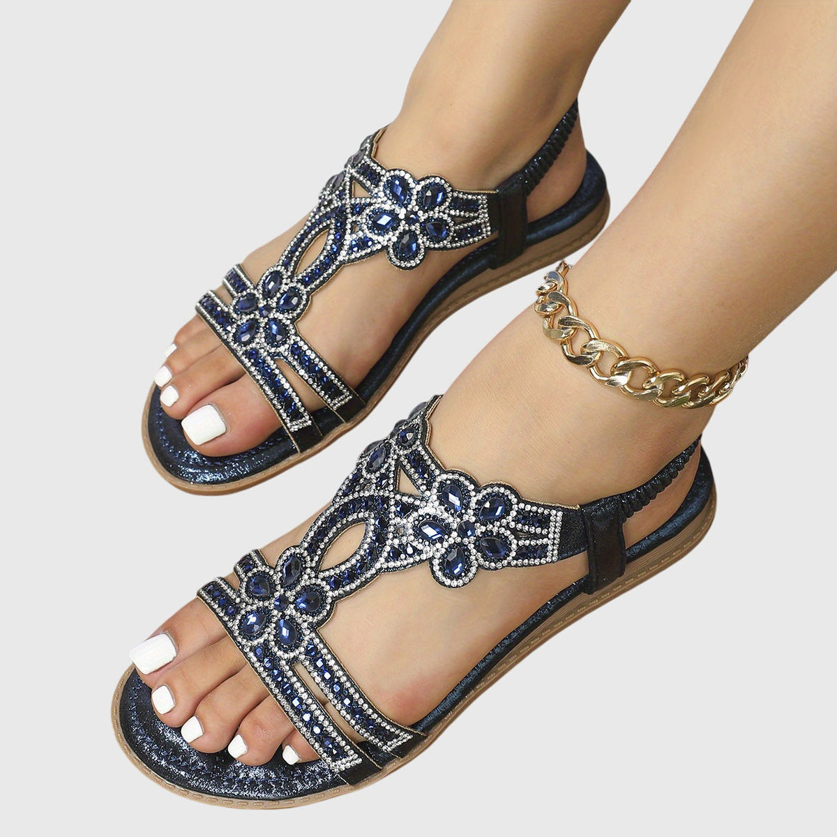 Sandaler med hälrem och dekorativa stendetaljer