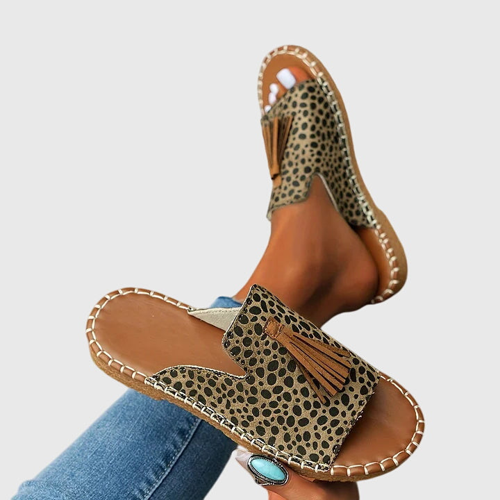Dämpad sandal med ovandel som andas