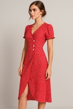 Vestido midi floral con cuello de pico y detalle de botones laterales