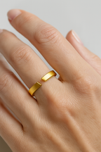 Justerbar öppen ring i polerad guld- eller silverton