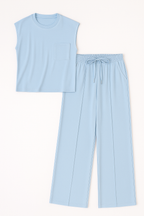 Conjunto de pantalones de pierna ancha y blusa de hombro caído