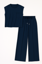 Conjunto de pantalones de pierna ancha y blusa de hombro caído