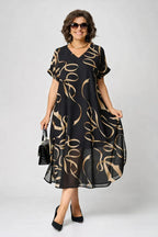 Vestido midi suave con cuello de pico y corte holgado