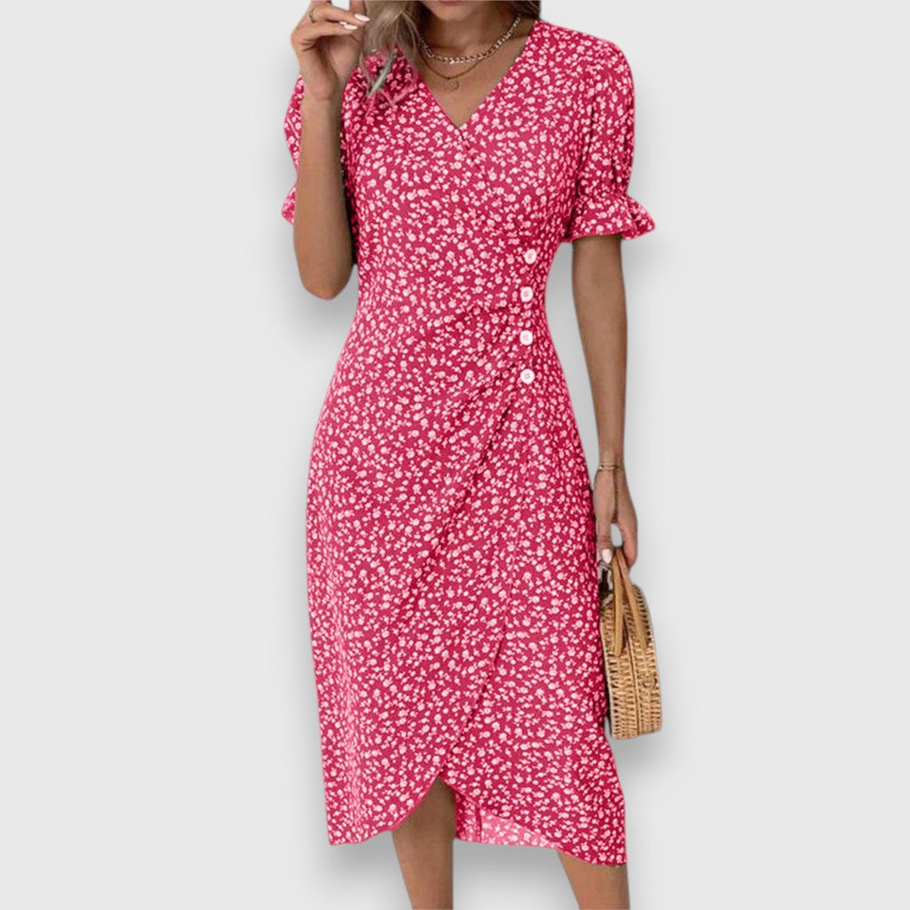 Vestido floral con mangas abullonadas y detalle romántico