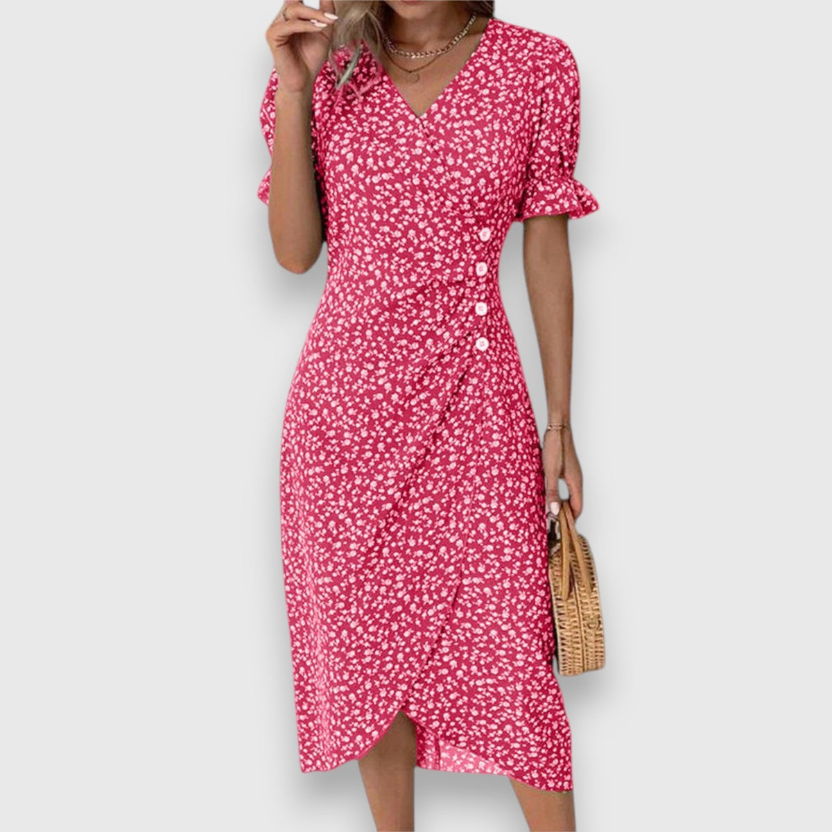 Vestido floral con mangas abullonadas y detalle romántico