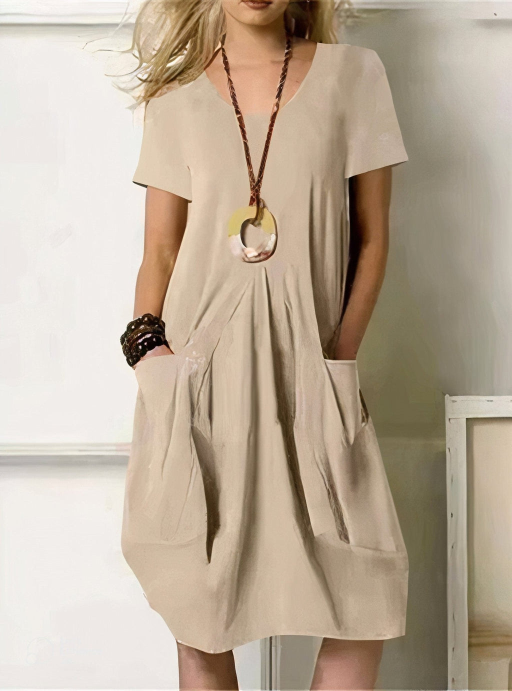 Vestido midi de algodón con escote redondo y bolsillos