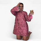 Vestido mini de lentejuelas integral con un corte que roza la figura