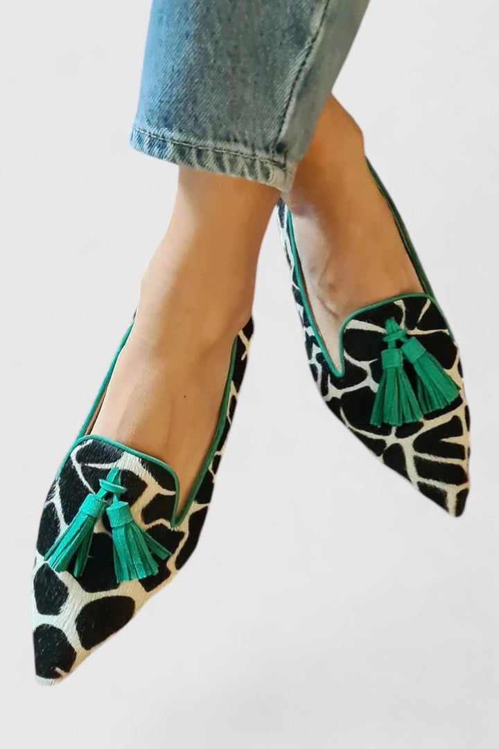 Loafers med spetsig tå och öppen design