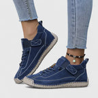 Sneakers med bred tåbox, skumsula och resårpaneler