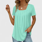 Blusa de verano con escote cuadrado y pliegues sutiles