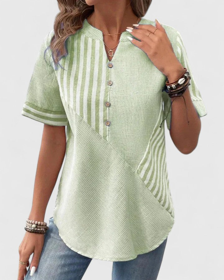 Blusa de rayas con corte holgado y clásico