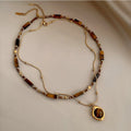 Golden-Brown Banded Stone Pendant Necklace with Warm Earthy Tones