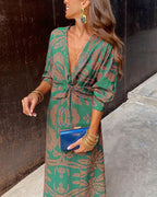 Vestido largo estampado con escote de pico y manga larga