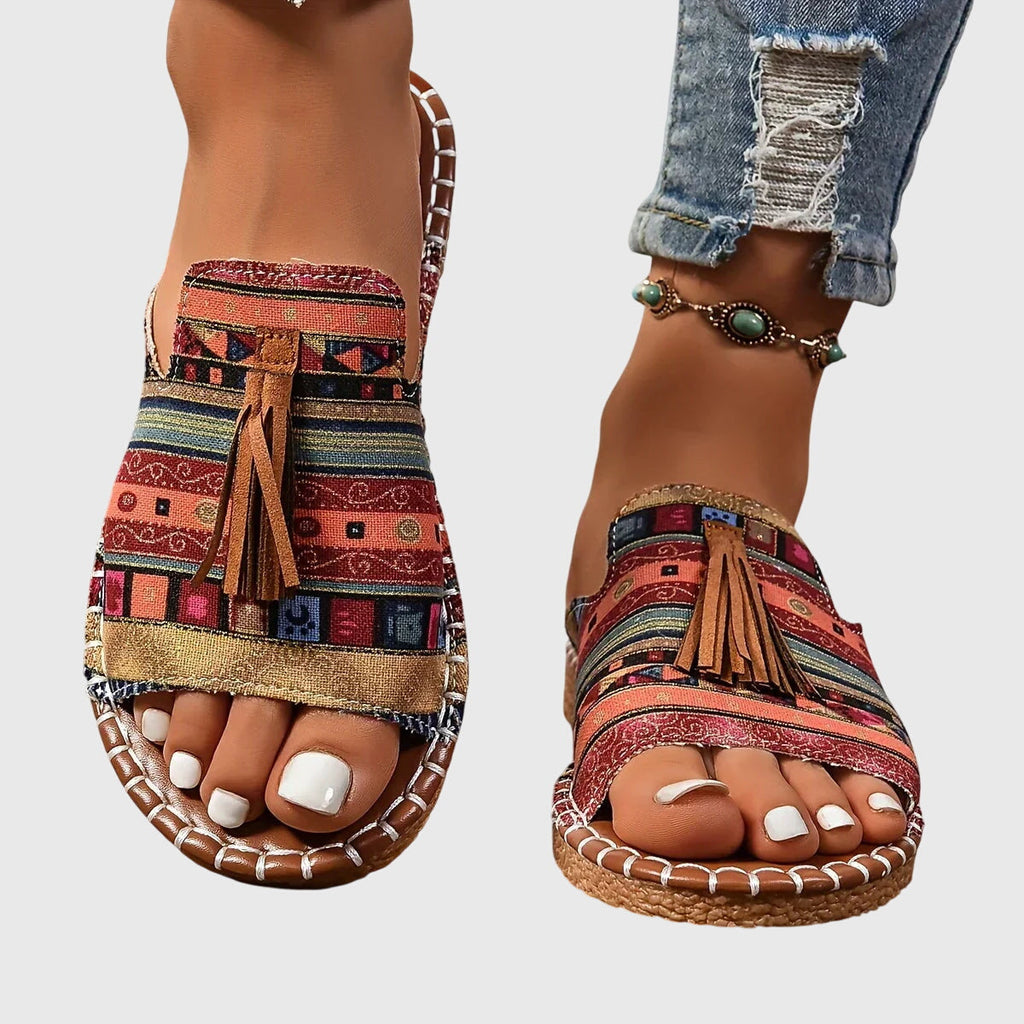 Dämpad sandal med ovandel som andas