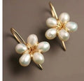 Vintage-Style White Glass Flower Earrings with Soft Glow