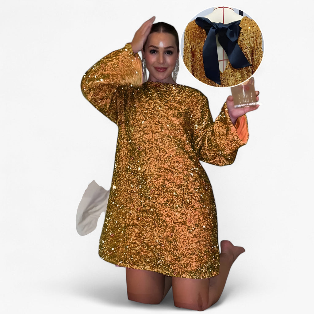 Vestido mini de lentejuelas integral con un corte que roza la figura
