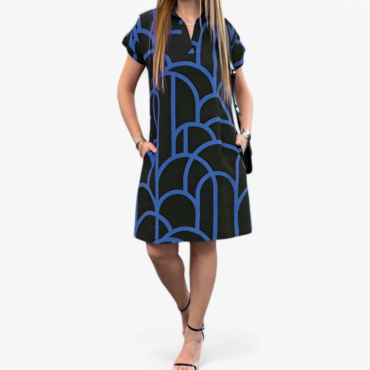 Vestido midi por capas con manga corta y caída fluida