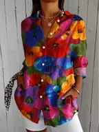 Blusa de botones con estampado vibrante en tejido ligero