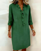 Vestido de algodón y lino con cuello de pico y detalle de volantes