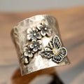 Wide Band Ring with Flower and Butterfly Relief in Silver Colour