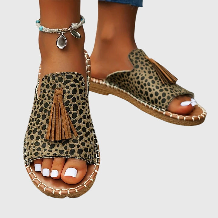 Dämpad sandal med ovandel som andas