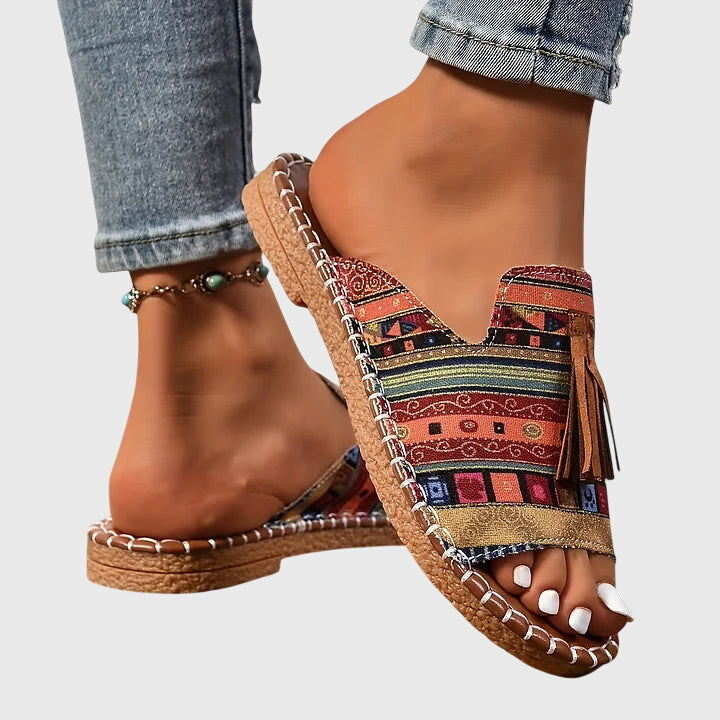 Dämpad sandal med ovandel som andas