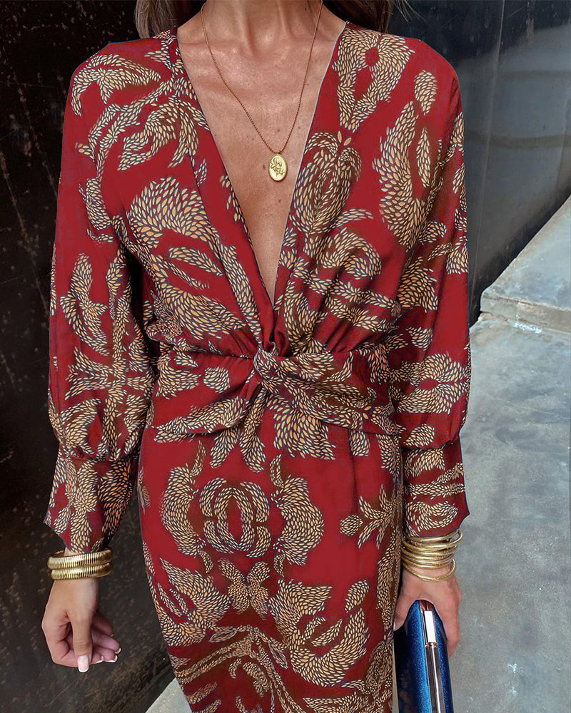 Vestido largo estampado con escote de pico y manga larga