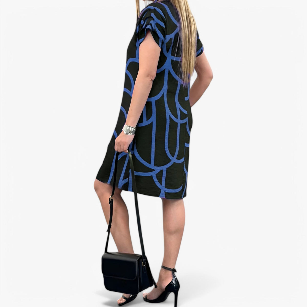 Vestido midi por capas con manga corta y caída fluida