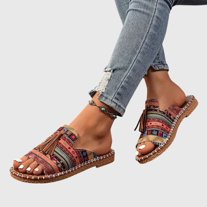 Dämpad sandal med ovandel som andas